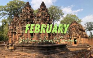 Cambodia in February: A promotional travel image featuring the intricately carved red sandstone towers of an ancient Khmer temple (Banteay Srei) under a clear blue sky. Large, textured lime-green text in the center reads "FEBRUARY," with the phrase "Best Time to Travel to Cambodia" written below it in a graceful green cursive script.
